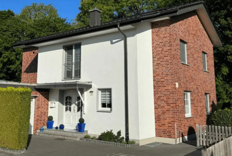 der Immobilienmakler